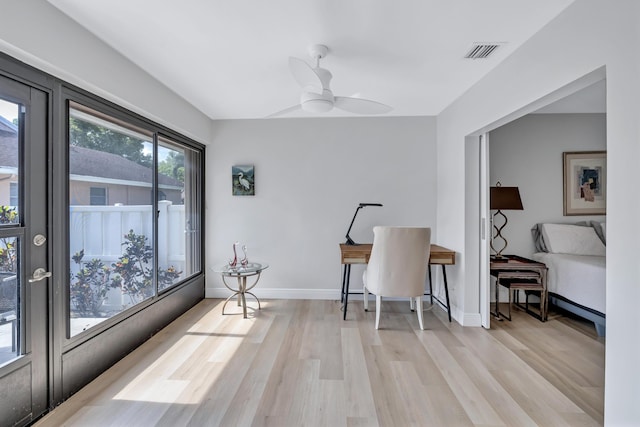 office area featuring ceiling fan and light hardwood / wood-style floors