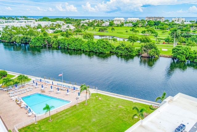 birds eye view of property featuring a water view