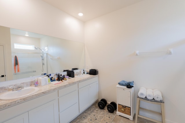 bathroom featuring vanity and tile patterned flooring