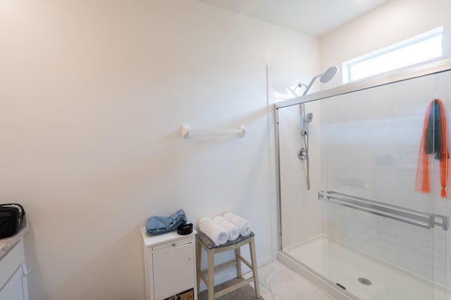 bathroom with an enclosed shower