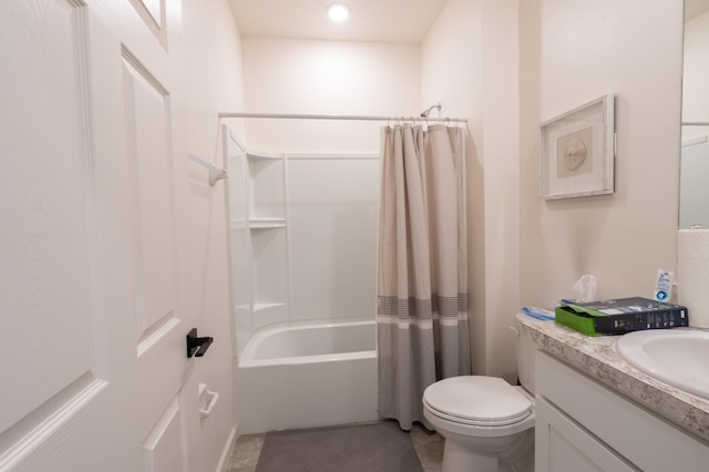 full bathroom with shower / bath combo, vanity, and toilet