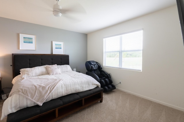 bedroom with ceiling fan and carpet