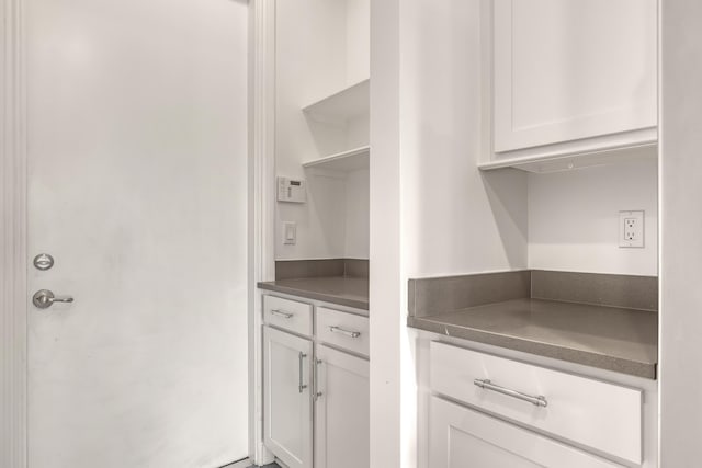 kitchen with white cabinetry