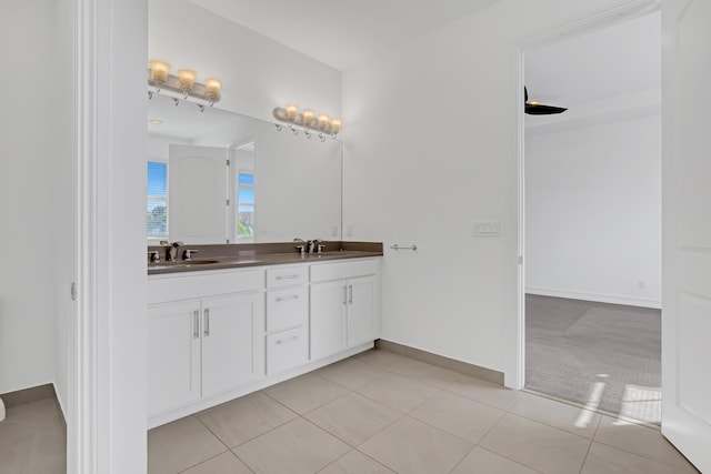 bathroom with tile patterned flooring and vanity