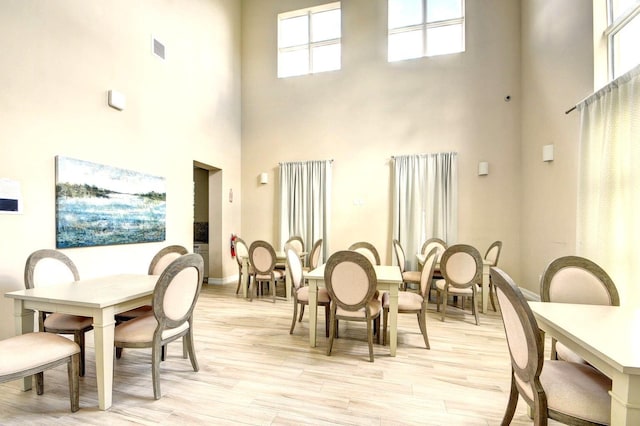 dining room with light hardwood / wood-style floors