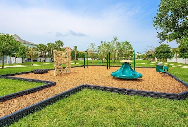 view of jungle gym with a lawn