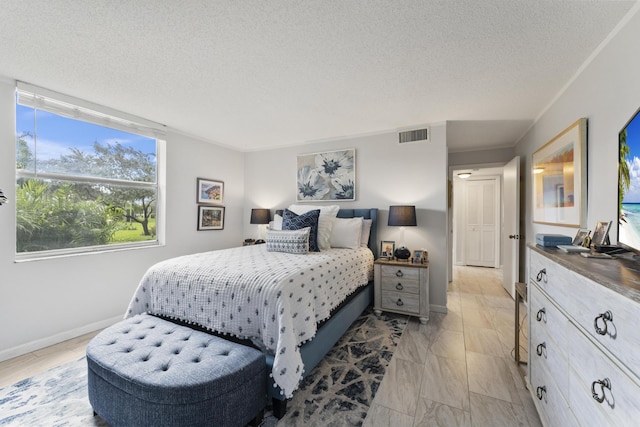 bedroom featuring a textured ceiling