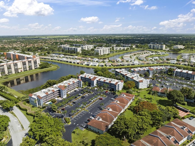 drone / aerial view with a water view