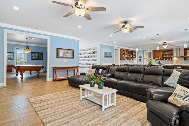 11951 Torreyanna Cir, Palm Beach Gardens, FL 33412 - living room featuring light wood-type flooring, billiards, ornamental molding, and baseboards