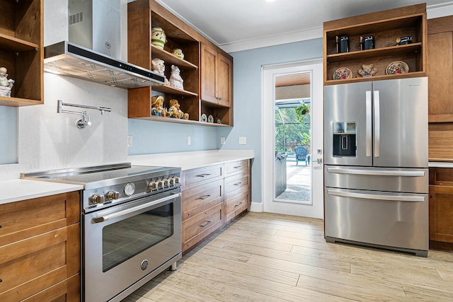 11951 Torreyanna Cir, Palm Beach Gardens, FL 33412 - kitchen featuring stainless steel appliances, light countertops, wall chimney range hood, and open shelves