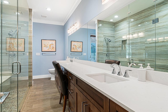 11951 Torreyanna Cir, Palm Beach Gardens, FL 33412 - full bath with double vanity, toilet, crown molding, a shower stall, and a sink
