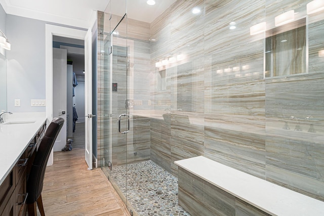 11951 Torreyanna Cir, Palm Beach Gardens, FL 33412 - full bathroom featuring a shower stall, wood finished floors, and vanity