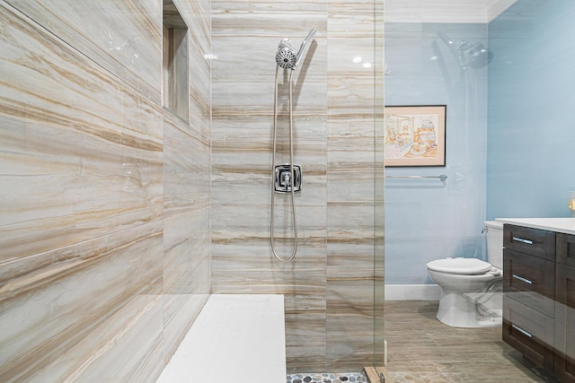 11951 Torreyanna Cir, Palm Beach Gardens, FL 33412 - full bathroom featuring a tile shower, vanity, and toilet