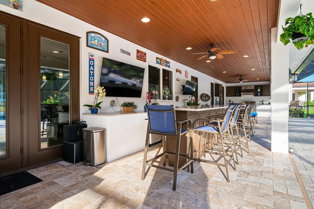 11951 Torreyanna Cir, Palm Beach Gardens, FL 33412 - view of patio with outdoor dry bar and a ceiling fan