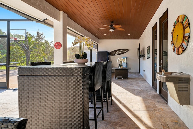 11951 Torreyanna Cir, Palm Beach Gardens, FL 33412 - view of patio featuring outdoor dry bar and a ceiling fan