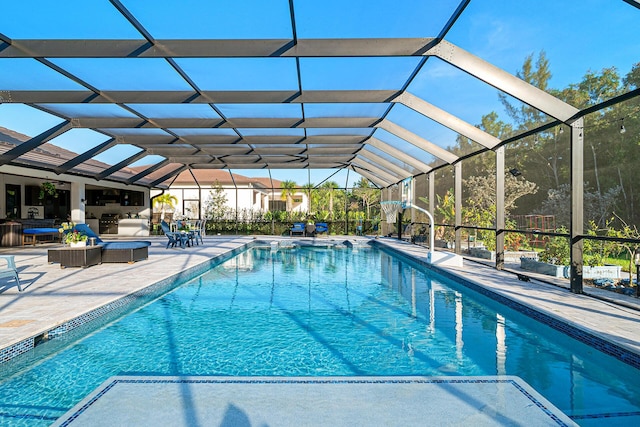 11951 Torreyanna Cir, Palm Beach Gardens, FL 33412 - outdoor pool featuring glass enclosure, a patio area, and outdoor lounge area