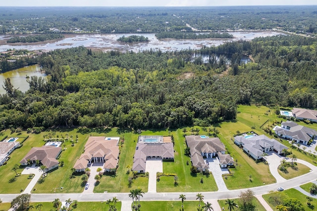 11951 Torreyanna Cir, Palm Beach Gardens, FL 33412 - drone / aerial view with a water view, a wooded view, and a residential view