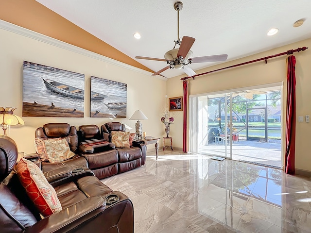 living room featuring ceiling fan and vaulted ceiling