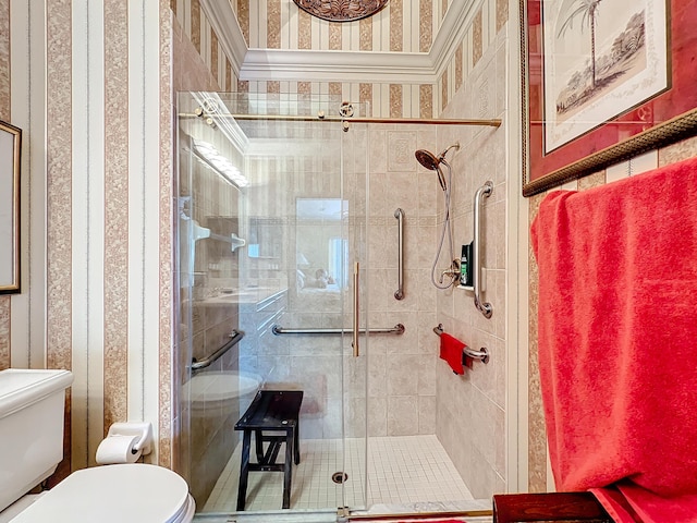 bathroom featuring toilet and an enclosed shower