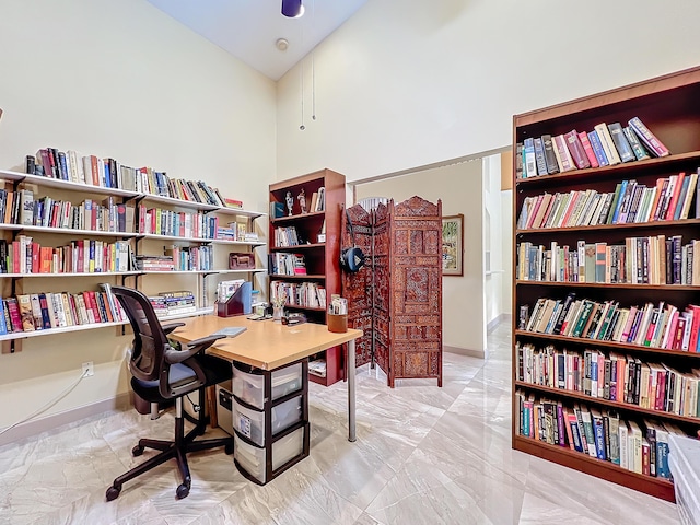 home office with high vaulted ceiling