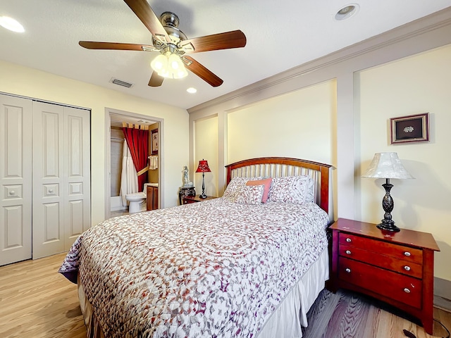 bedroom with ornamental molding, light hardwood / wood-style floors, a closet, and ceiling fan