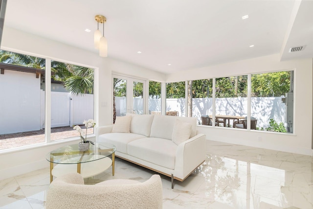 sunroom / solarium with marble finish floor, baseboards, visible vents, and recessed lighting