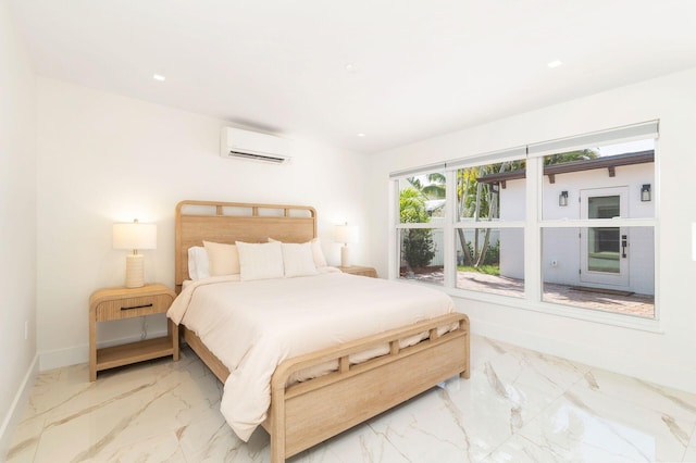 bedroom featuring a wall unit AC, marble finish floor, and baseboards