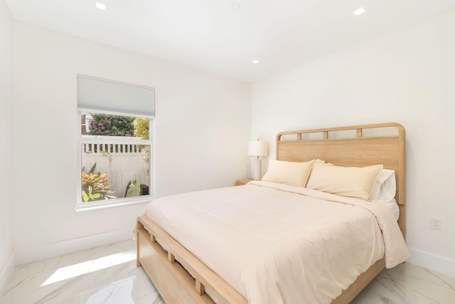 bedroom with marble finish floor, baseboards, and recessed lighting
