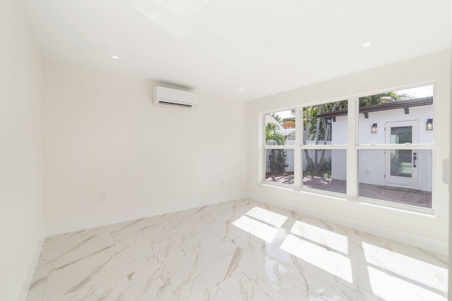 unfurnished room featuring marble finish floor, baseboards, and a wall mounted AC