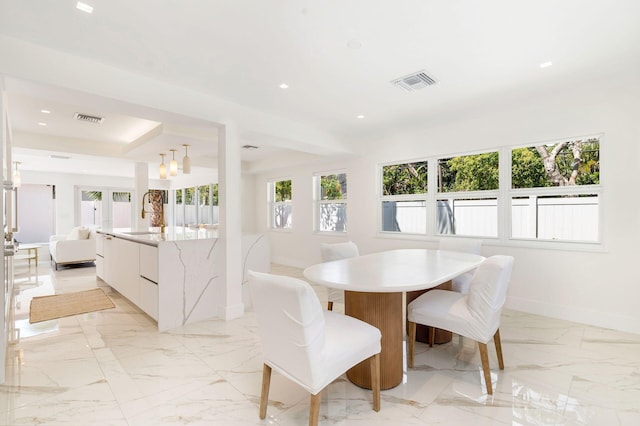 dining space featuring marble finish floor, baseboards, visible vents, and recessed lighting