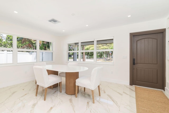 dining space featuring recessed lighting, visible vents, baseboards, and marble finish floor