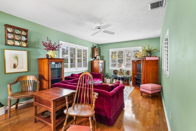 1210 Dolphin Rd, Singer Island, FL 33404 - bedroom featuring wallpapered walls, visible vents, a textured ceiling, and light colored carpet