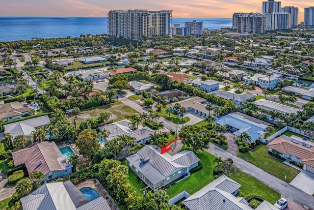 1210 Dolphin Rd, Singer Island, FL 33404 - drone / aerial view with a residential view and a water view