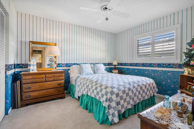 1210 Dolphin Rd, Singer Island, FL 33404 - bathroom with tile patterned flooring, wallpapered walls, a wealth of natural light, and a shower stall