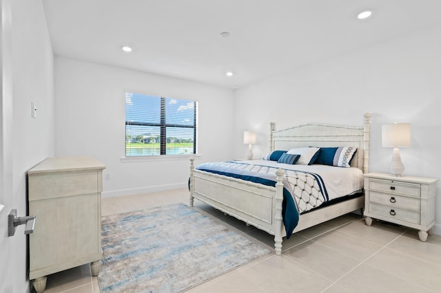 bedroom featuring light tile patterned flooring