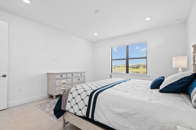 bedroom featuring light tile patterned floors