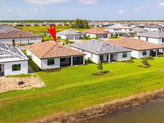 aerial view featuring a water view