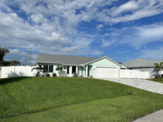 ranch-style home with a garage and a front yard