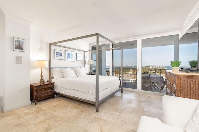 bedroom featuring ornamental molding, floor to ceiling windows, and access to outside