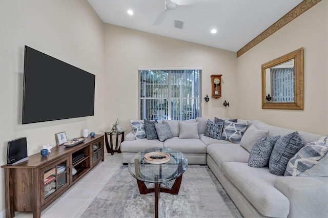 living room featuring light tile patterned flooring and lofted ceiling