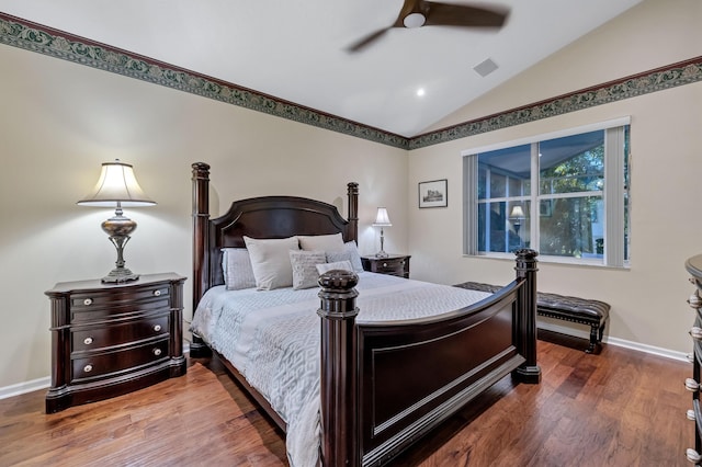 bedroom featuring ceiling fan, lofted ceiling, and hardwood / wood-style floors