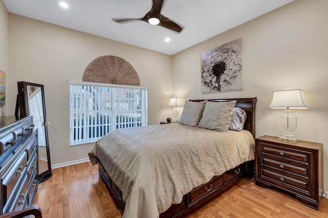 bedroom featuring ceiling fan and light hardwood / wood-style flooring