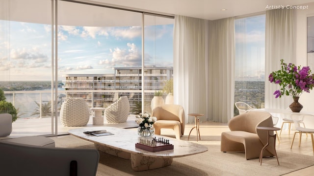 2200 Pga Blvd Unit 406, Palm Beach Gardens, FL 33410 - sitting room featuring a wall of windows, wood finished floors, and a water view