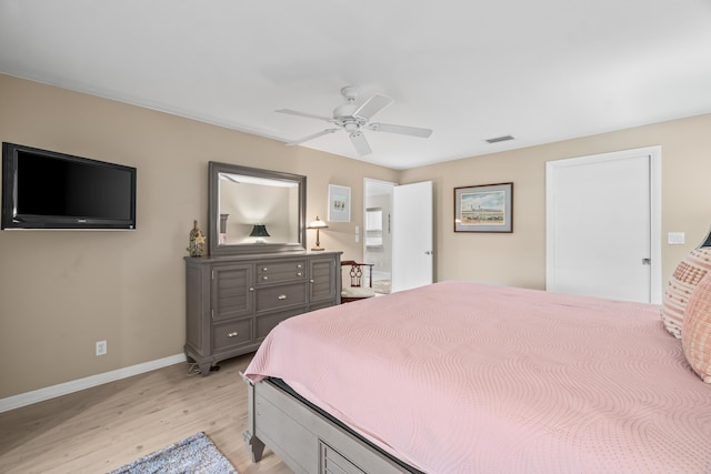 bedroom featuring light hardwood / wood-style flooring and ceiling fan