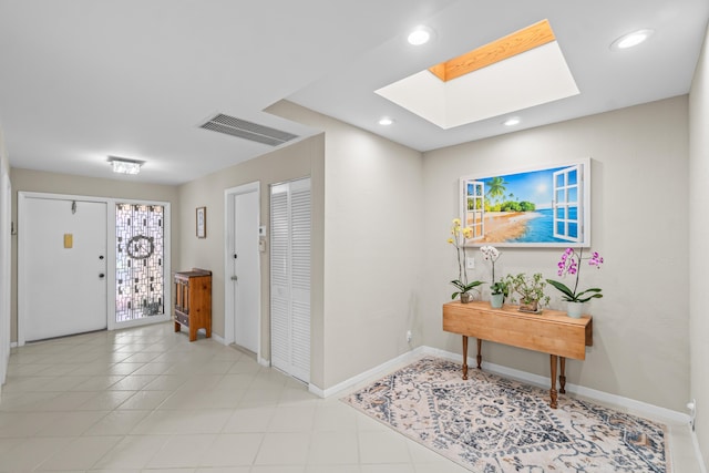 foyer with a skylight