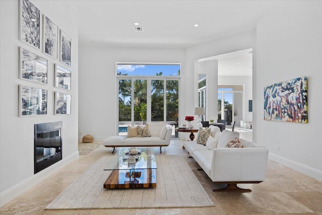 living room with a high ceiling