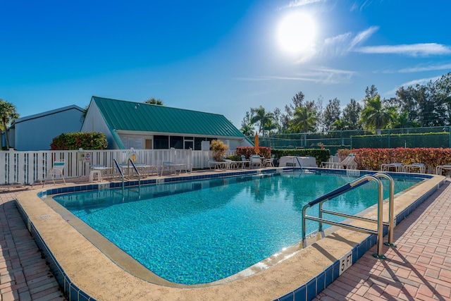 view of pool with a patio area