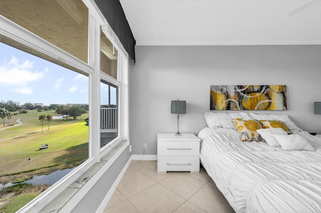 bedroom with light tile patterned floors