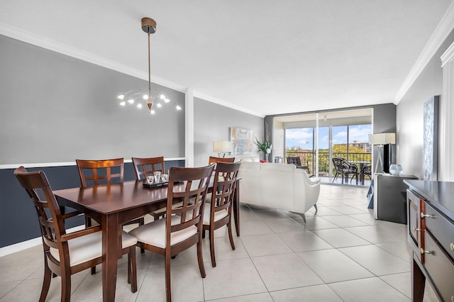 tiled dining area with expansive windows, ornamental molding, and an inviting chandelier