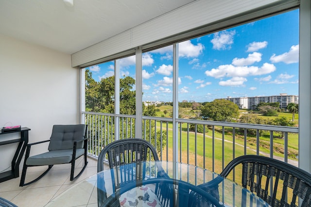 sunroom / solarium featuring a wealth of natural light